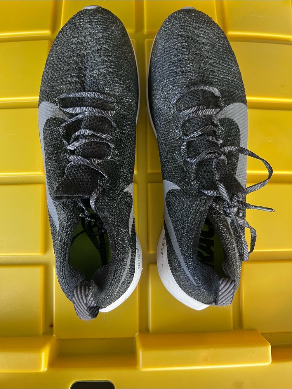 Nike Men’s Black and White Flyknit Running Shoes